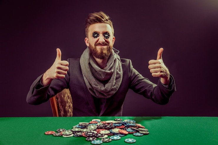 Live dealer revealing two cards at Dragon Tiger table